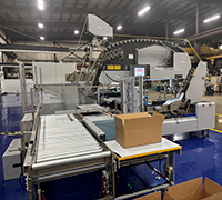 Signature SIG-PACK automatic carton packer with boxes